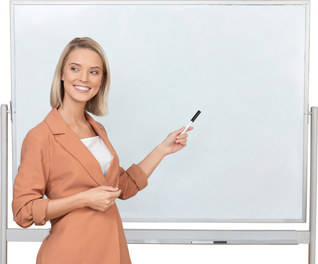 Female Teacher Gesturing to a White Board with a Marker